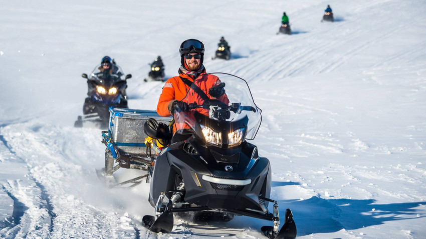 What do Russians do, beyond Moscow? They surf in snowstorms, lead dog ...