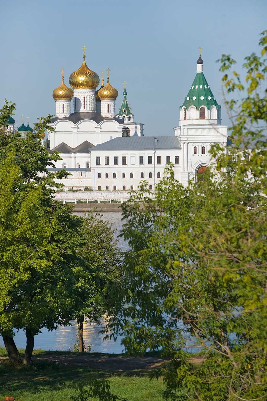 Trinity-Ipatiev Monastery, east view across Kostroma River. From left: Trinity Cathedral; Archbishop's Cloisters with Gate Church of Sts. Chrysanthus & Daria. Aug. 13, 2017