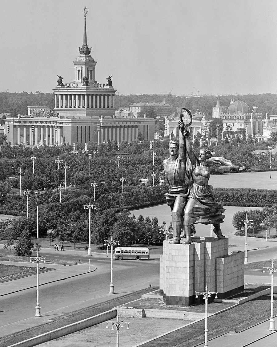 A view of Worker and Kolkhoz Woman monument (front) by Vera Mukhina and Central Pavillion (background) from the side of Mira Avenue, 1959. Mukhina was very displeased with that view.