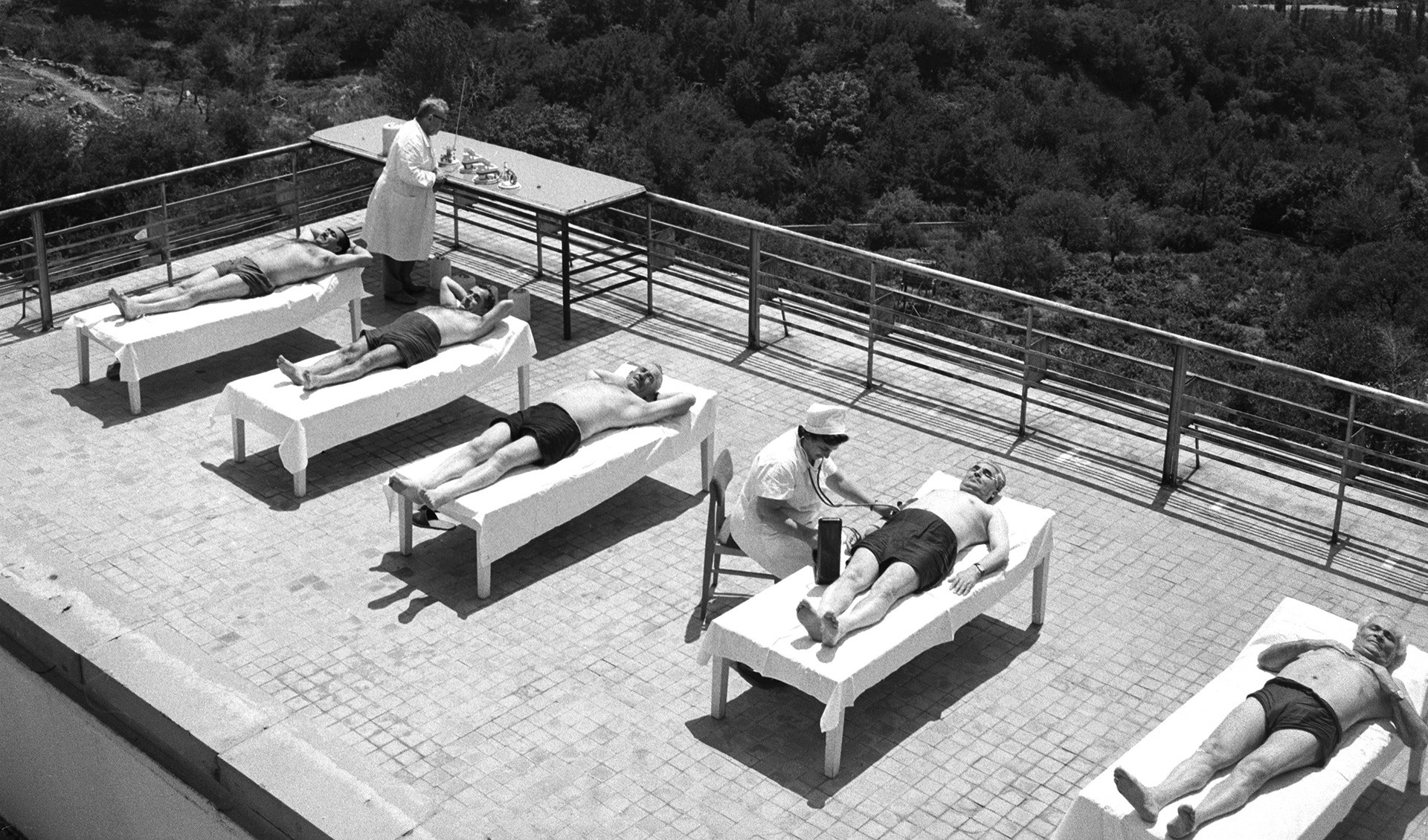 Sanatorium patients go for a well-earned sunbathing session.