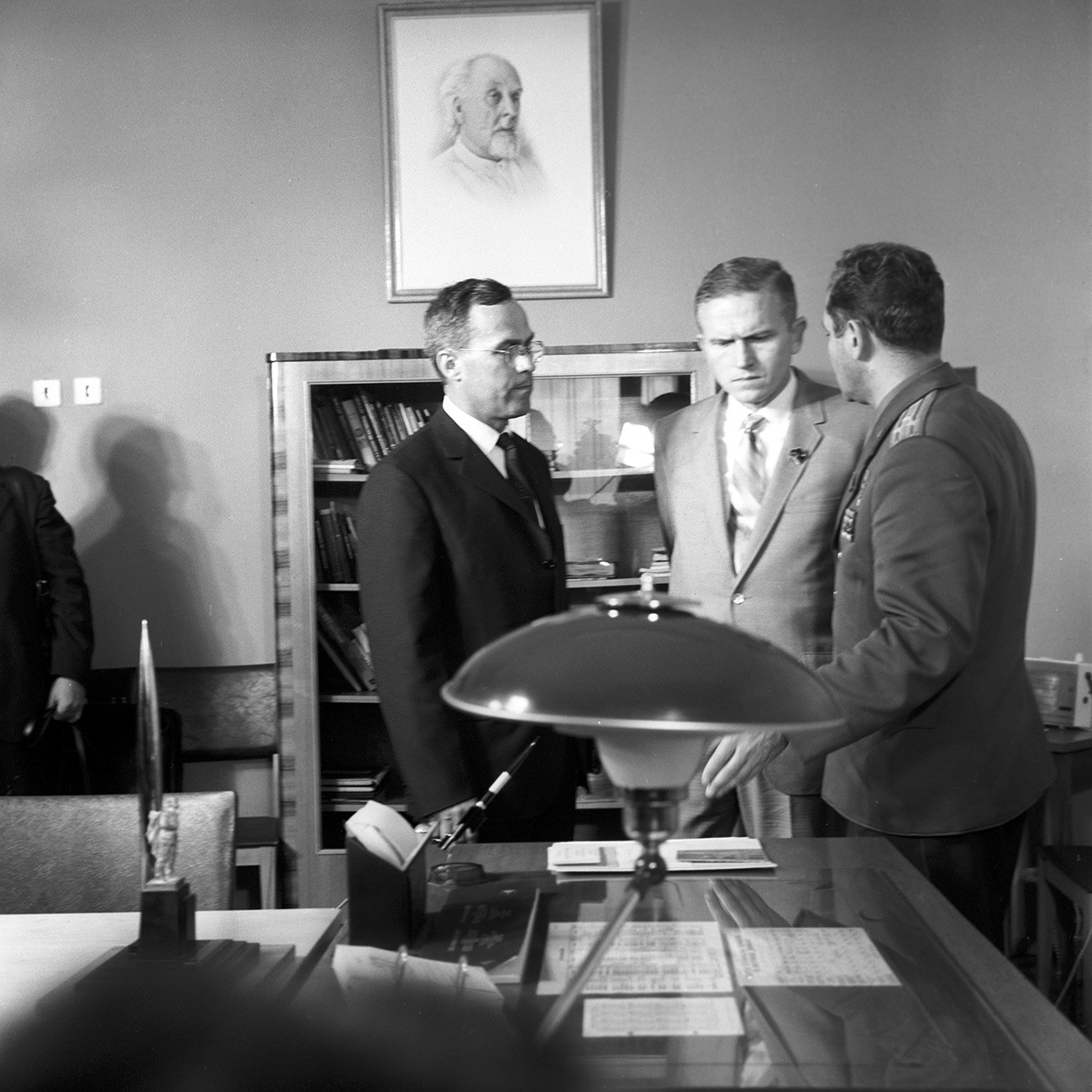 USSR astronaut German Stepanovich Titov (right) and American astronaut Frank Frederick Borman (center)