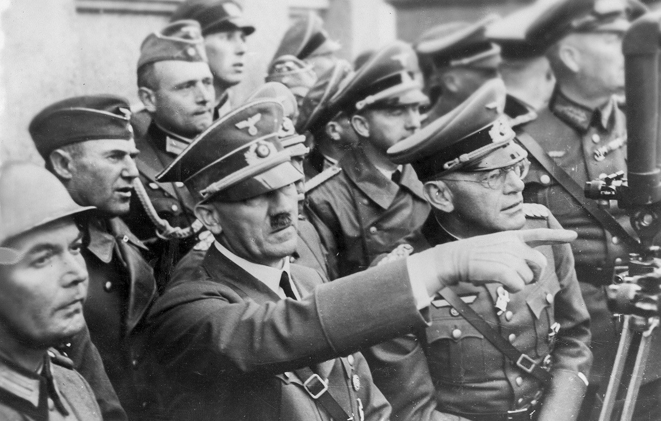 Adolf Hitler among the Wehrmacht soldiers during Germany's Polish campaign of 1939.