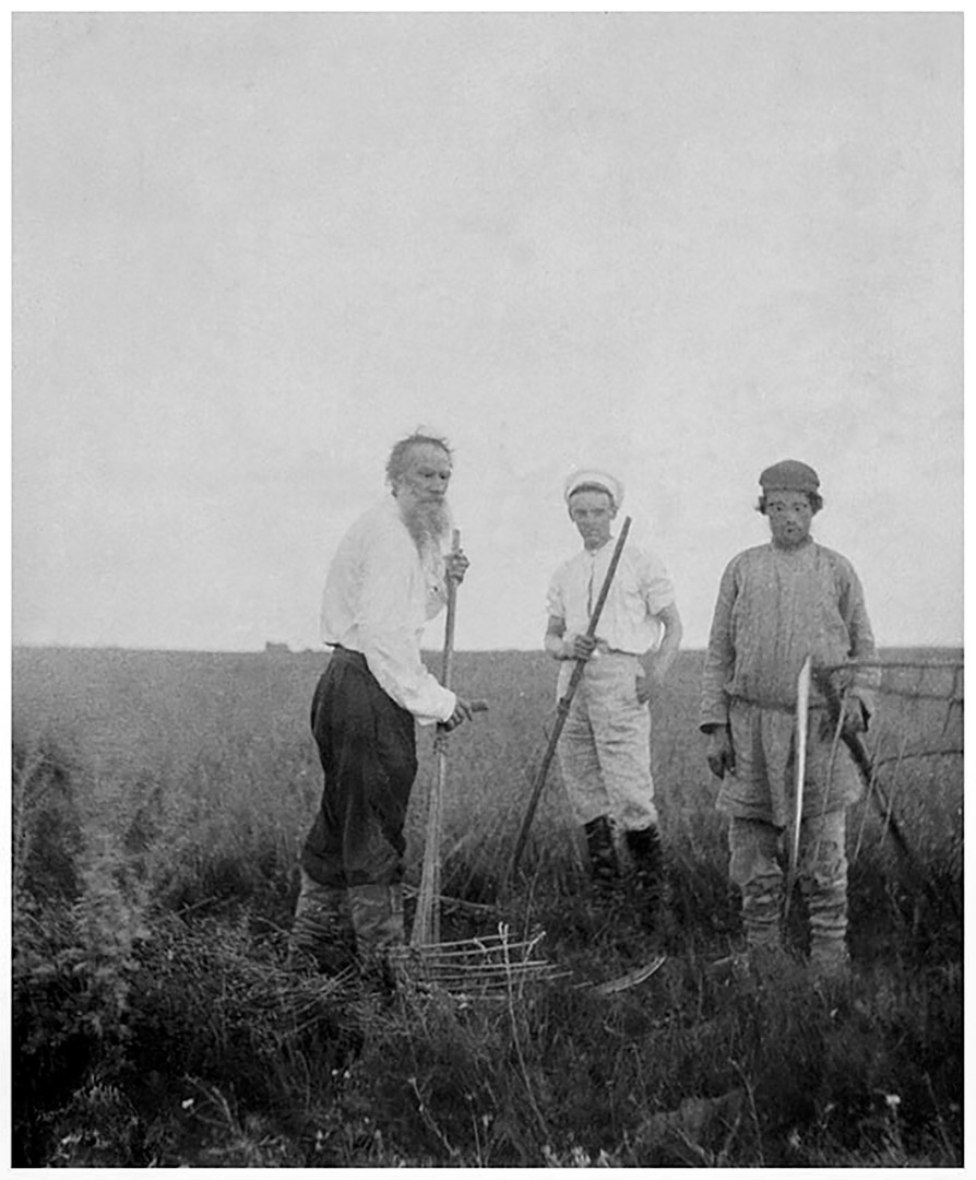Leo Tolstoy (left) working in his Yasnaya Polyana estate.