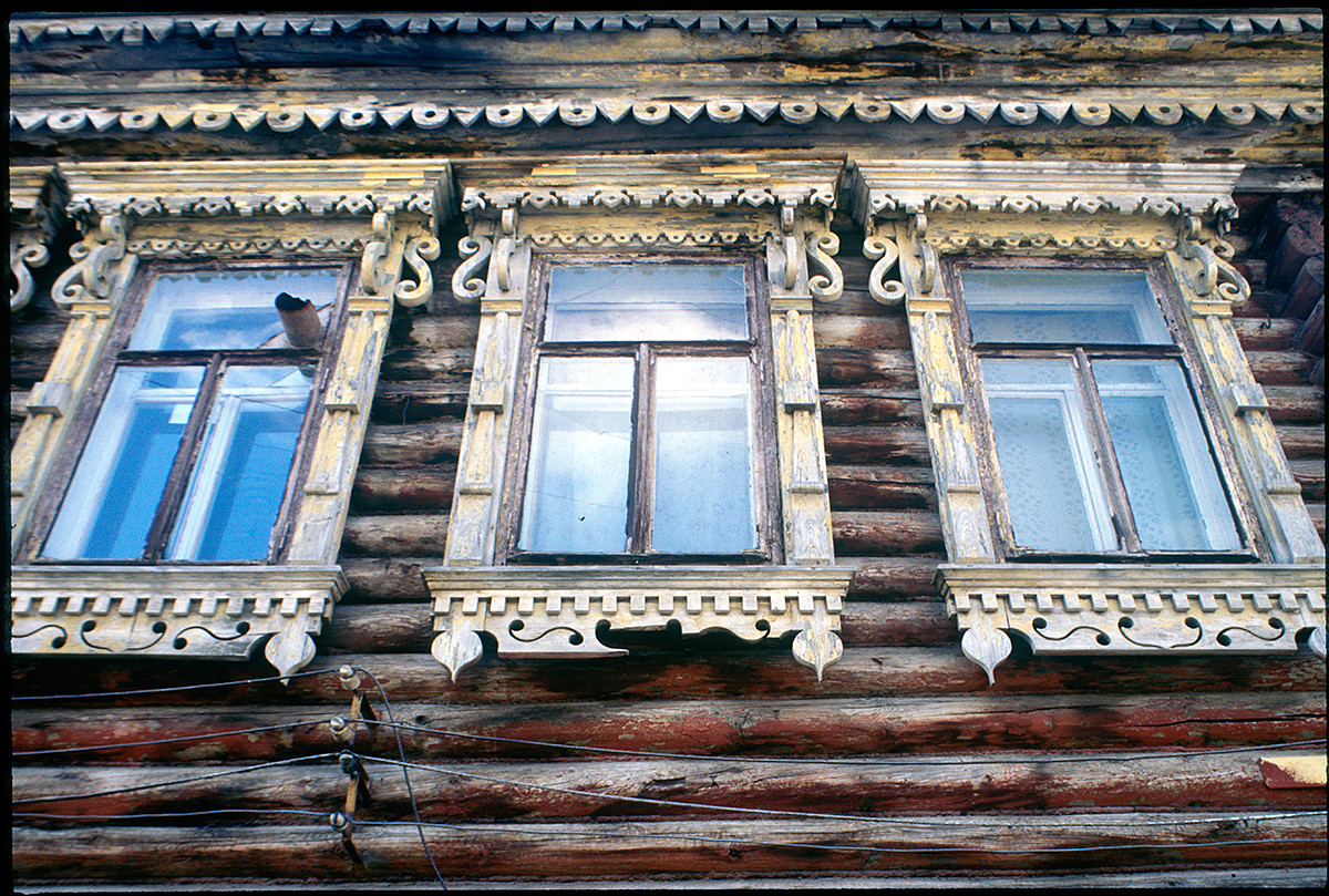 Wooden house, Sts. Peter & Paul Street. Log structure with decorative window surrounds. August 23, 1999  