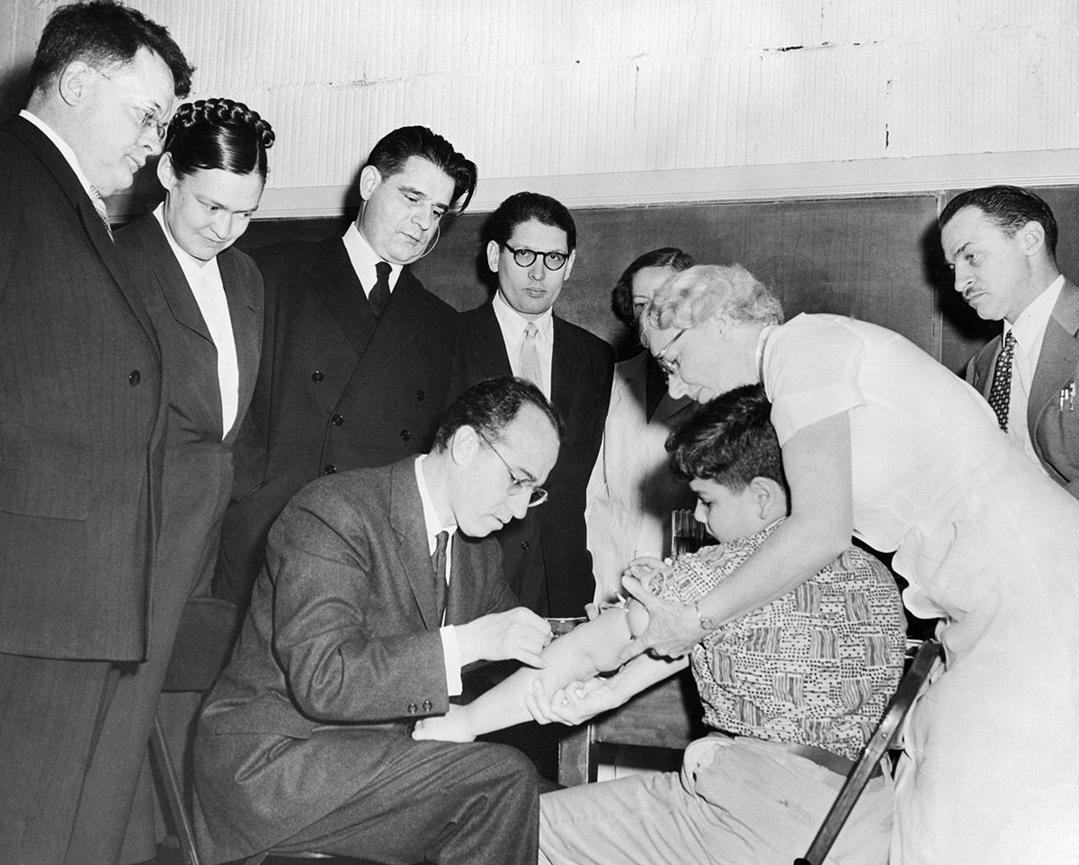 Dr. Salk and the Soviet delegation with Anatoly Smordintsev, Marina Voroshilova and Mikhail Chumakov.