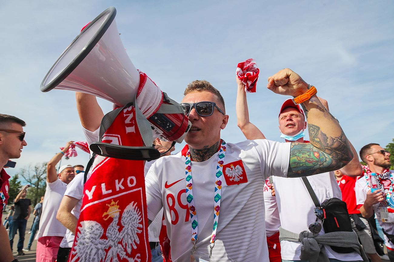 Fans at the Gazprom Arena stadium before the start of the European Football Championship match: Poland vs Slovakia.