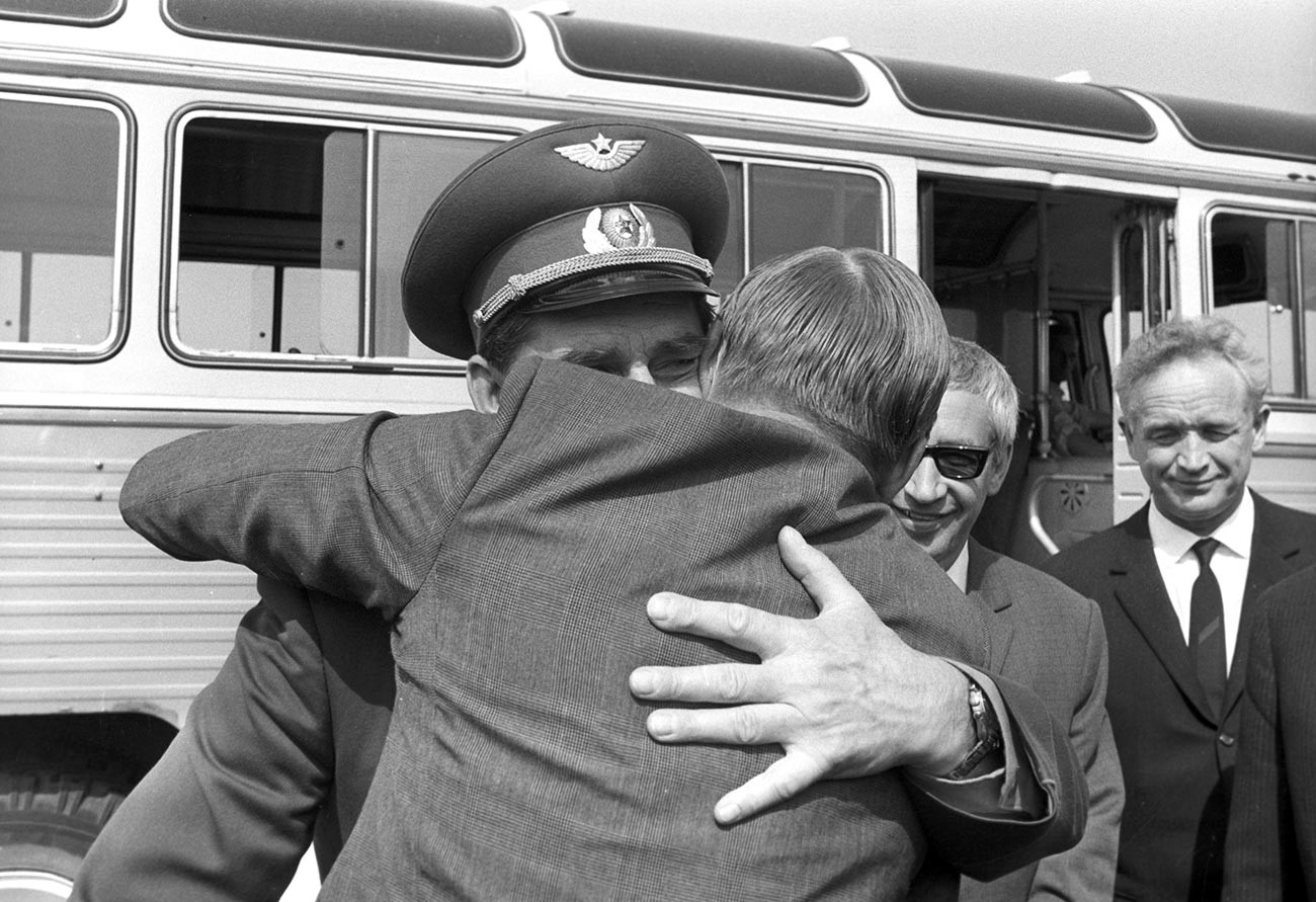 USSR pilot cosmonaut Georgy Beregovoy says goodbye to US astronaut Neil Armstrong at Sheremetyevo airport.