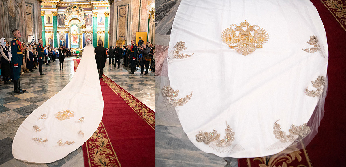 Kerudung pengantin wanita dengan lambang Kekaisaran Rusia benar-benar terseret di lantai...