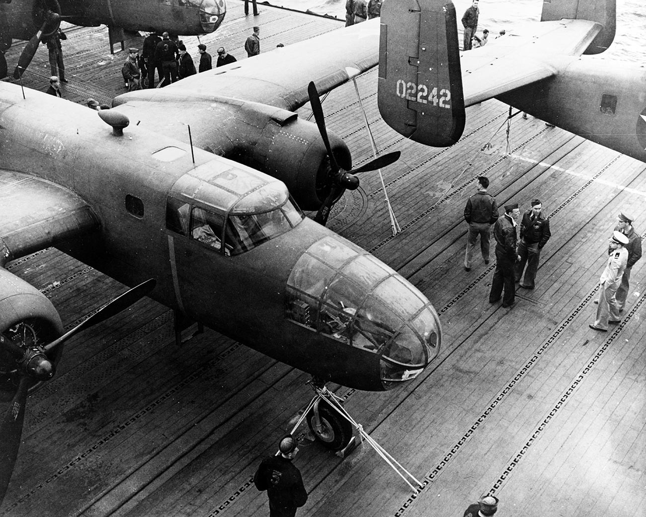 Army Air Forces B-25B bombers parked on the flight deck of the USS Hornet.