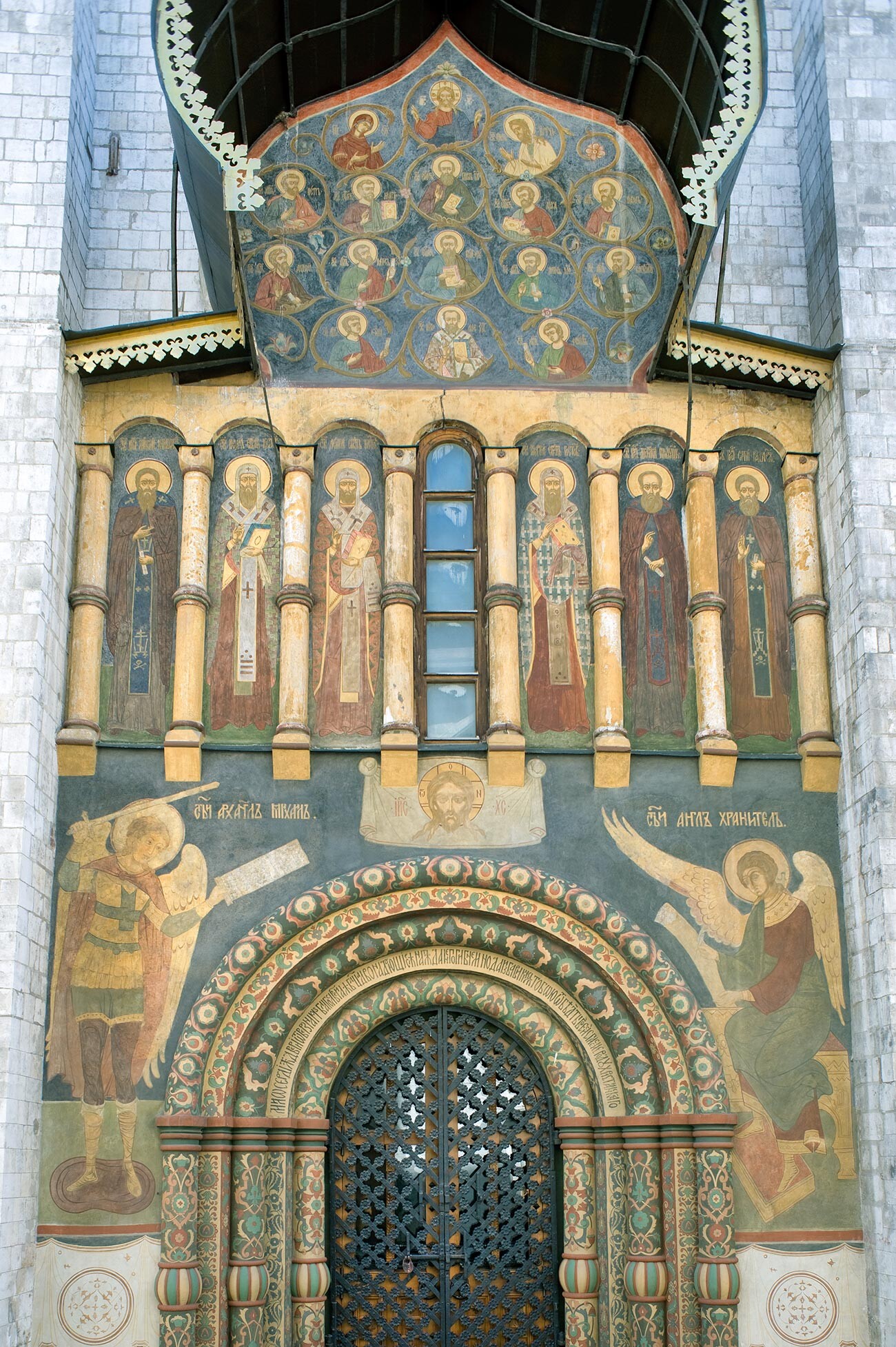 Dormition Cathedral. North facade, portal with blind arcade & images of Church Fathers. June 17, 2012