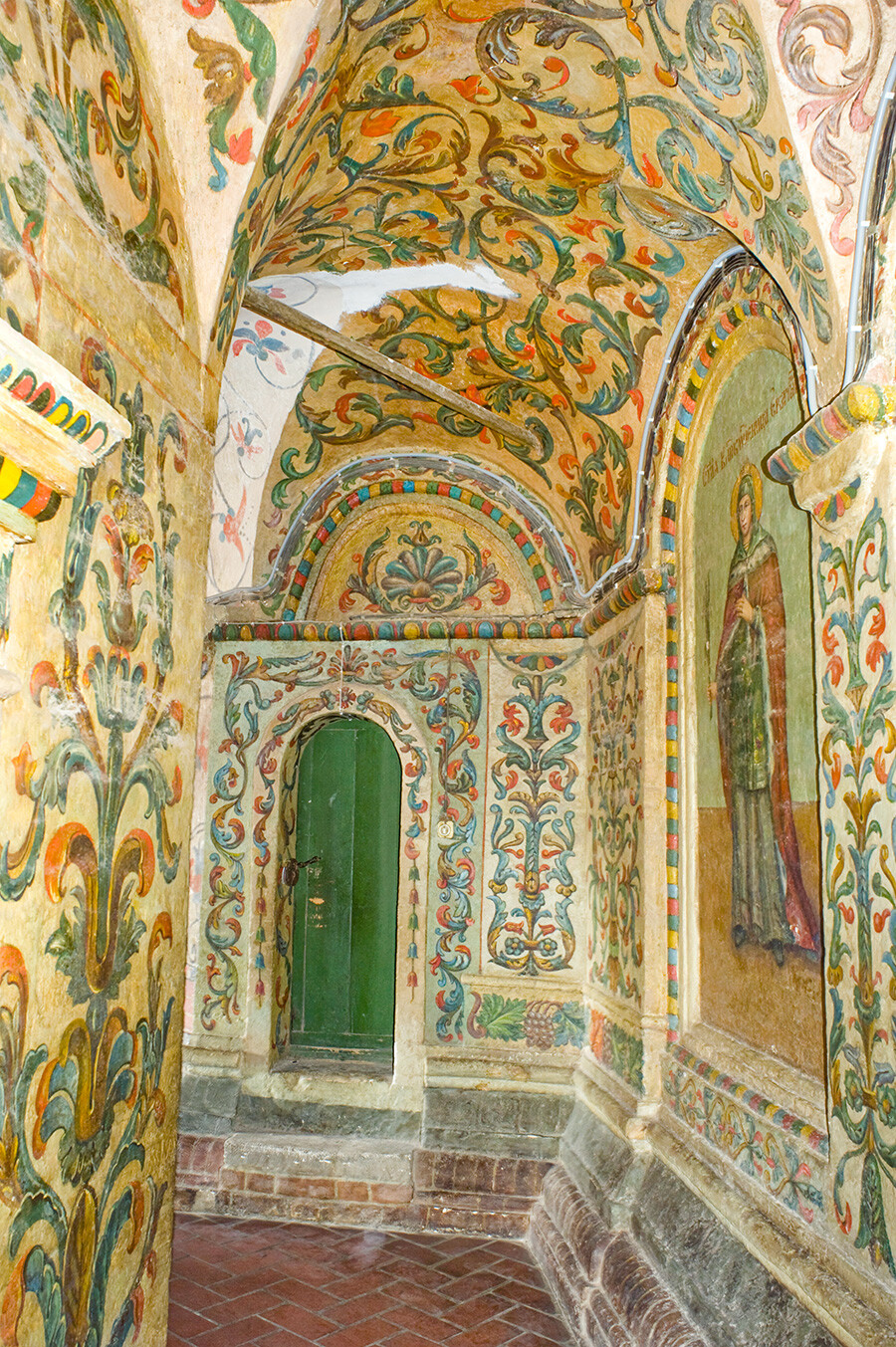 St. Basil's, interior. South gallery passage with 19th-century wall paintings. Left: painting of St. Catherine. June 2, 2012.