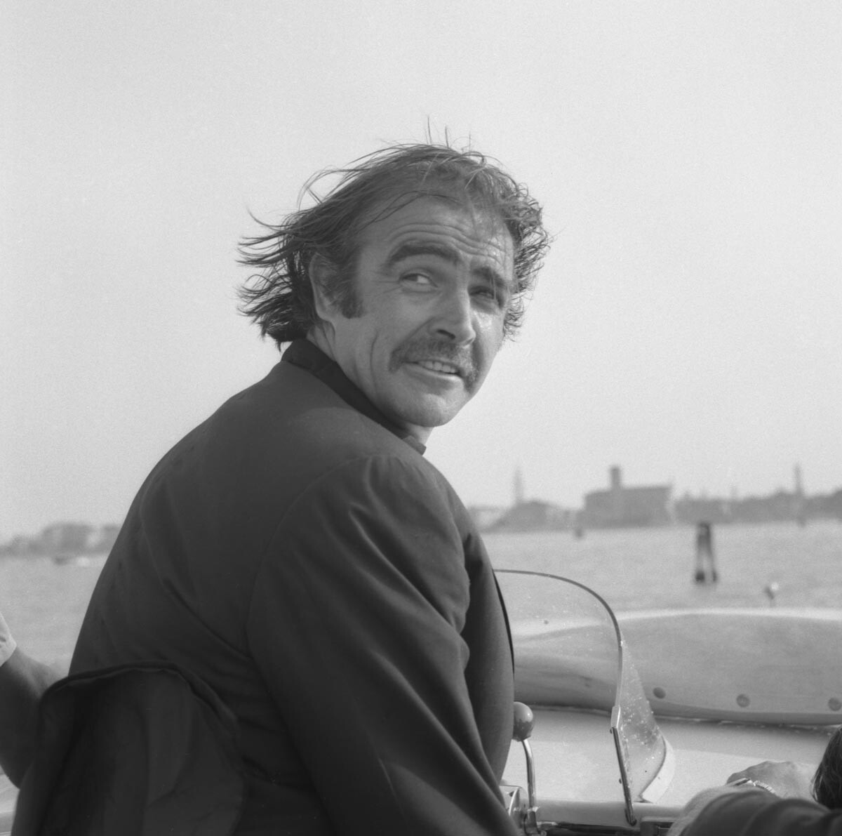 Sean Connery, pictured on a water taxi in Venice, 1970s.