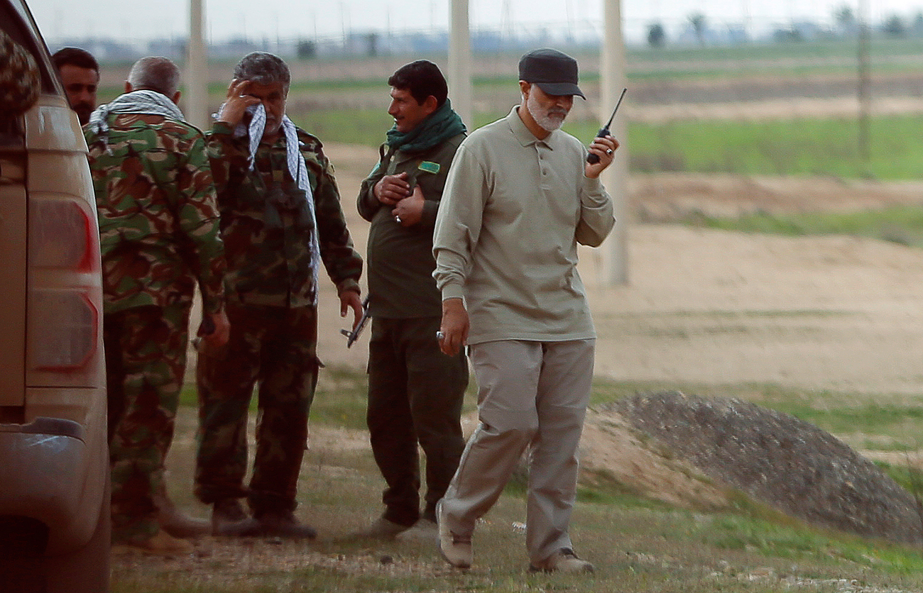 Iranian Revolutionary Guard Commander Qassem Soleimani uses a walkie-talkie at the frontline during offensive operations against Islamic State militants in the town of Tal Ksaiba in Salahuddin province. Source: Reuters