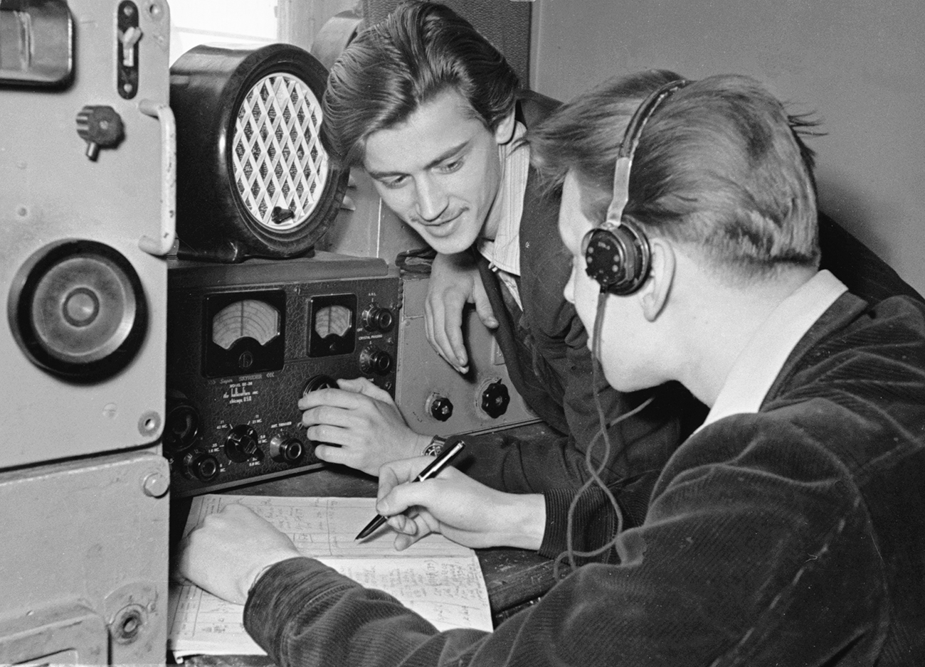 "Swing, early bebop and so on," recalled Pustyntsev. "I could not even go to sleep without first listening to the latest music program." Photo: Two men listen to radio in the Soviet Union on April 1, 1958. Source: TASS