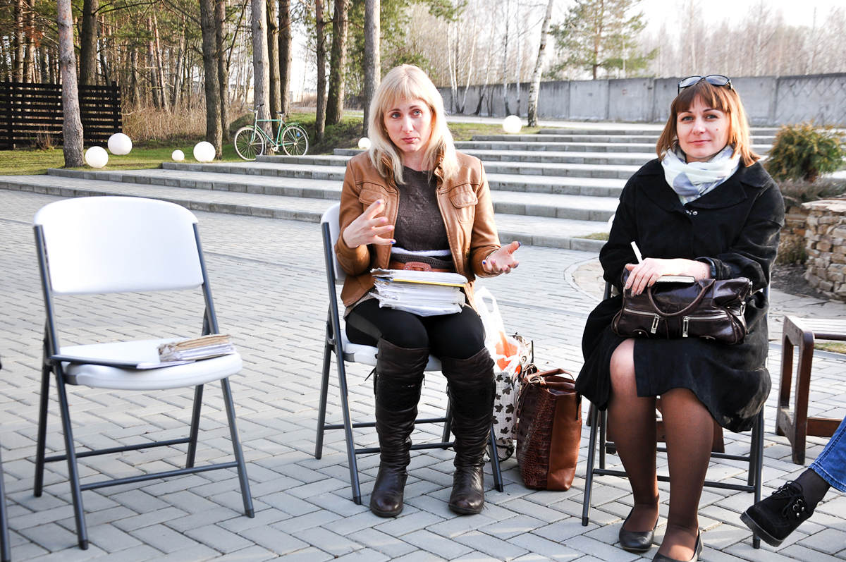 These are the mothers of Novozybkov, united by a non-profit organization. Galina Sviridenko, left, holds the documents of her son Denis, who was born in 2000 with multiple health issues that were caused by radiation.