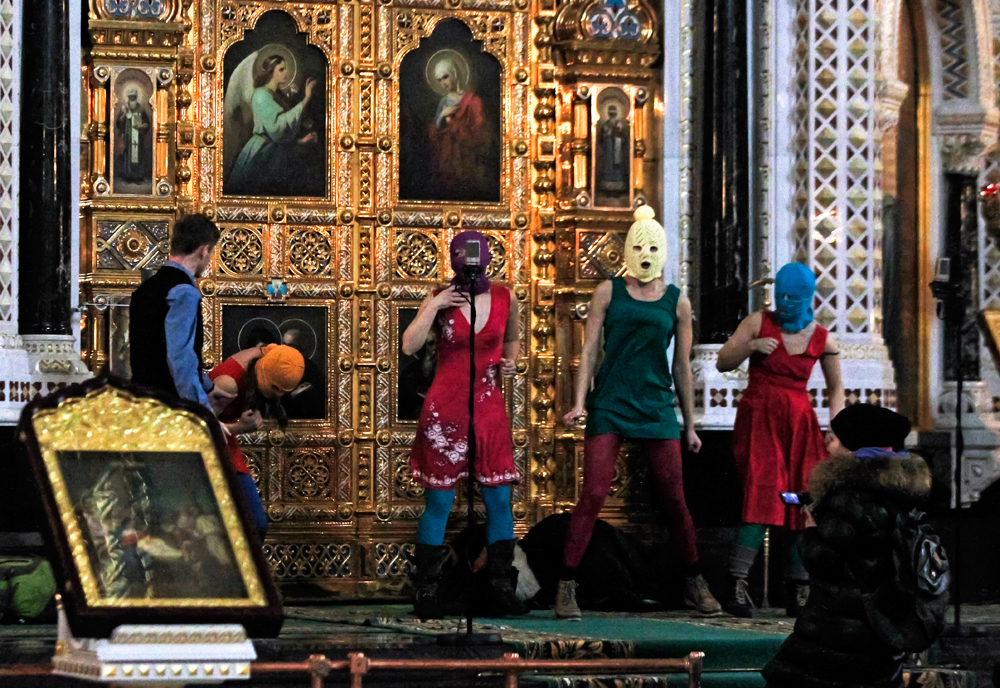 Members of the Russian radical feminist group Pussy Riot try to perform at the Christ the Saviour Cathedral in Moscow in February 2012. Two members of Pussy Riot were jailed. Source: Sergei Ponomarev / AP