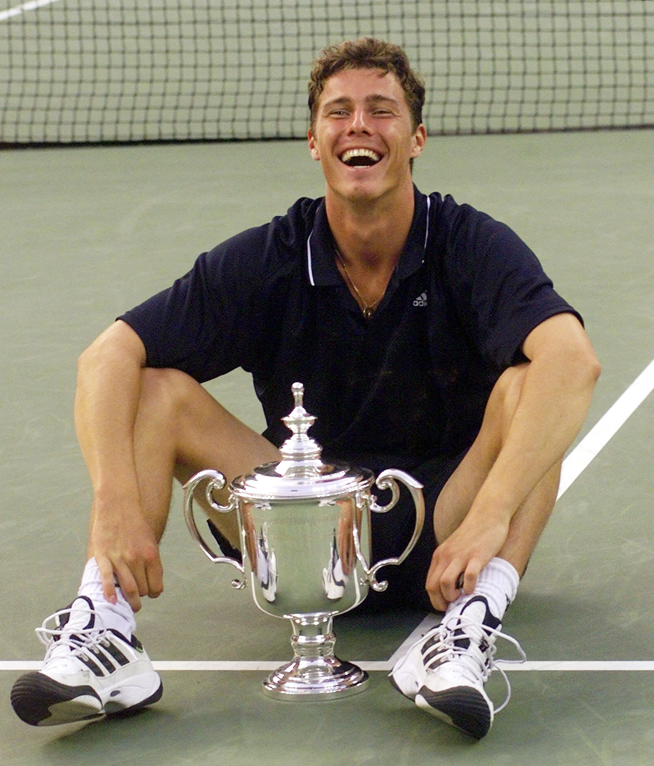 "Rusi z nasmehom izražajo, da so zares dobre volje ali pa imajo zares iskrene simpatije do sogovornika." Kot denimo tenisač Marat Safin, ki se je leta 2000 takole veselil zmage v finalu turnirja US Open. Foto: AP