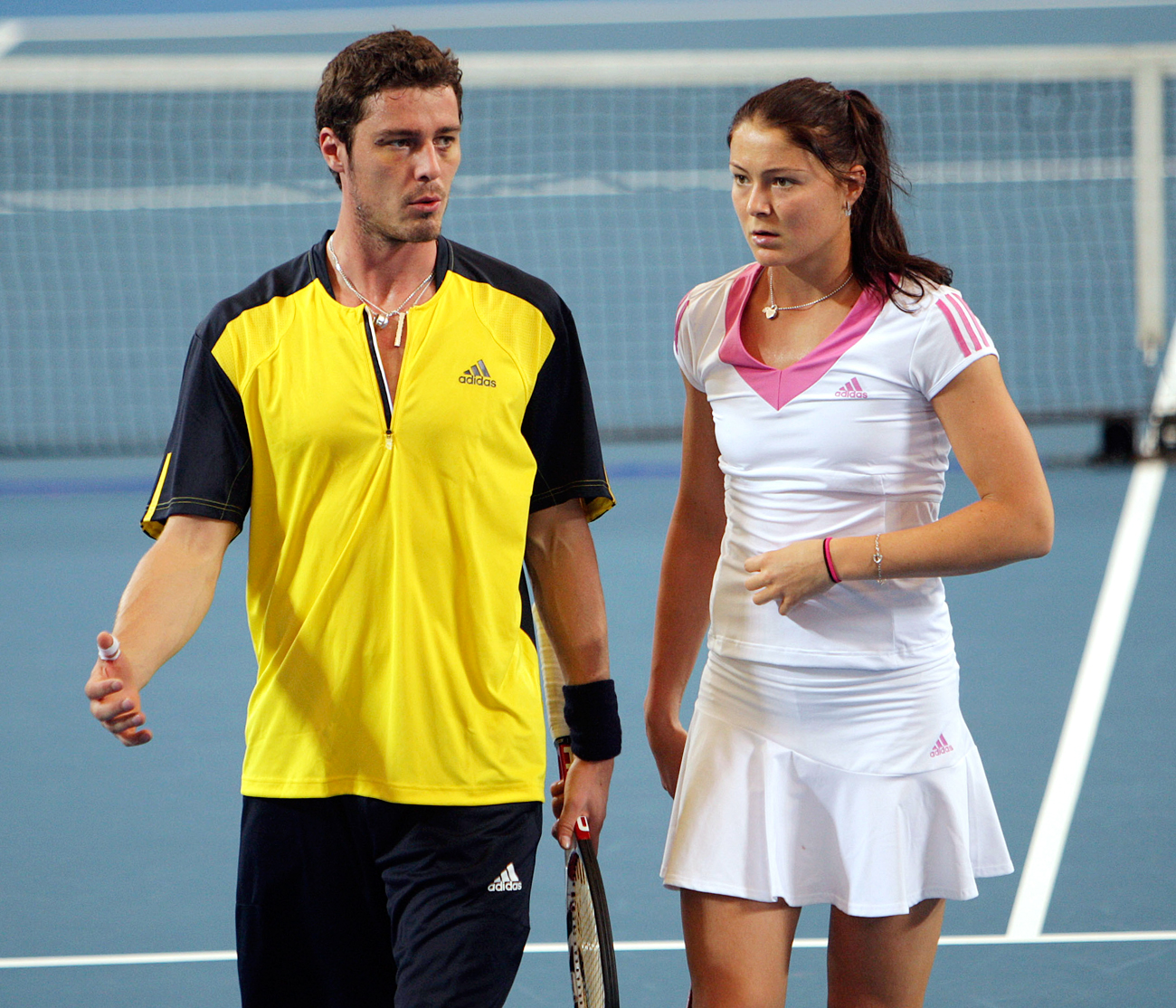 Russia&#39s Marat Safin and his sister Dinara Safina talk during their doubles match against Italy&#39s Simone Bolelli and Flavia Pennetta at the Hopman Cup in Perth, Western Australia, Jan. 4, 2009.