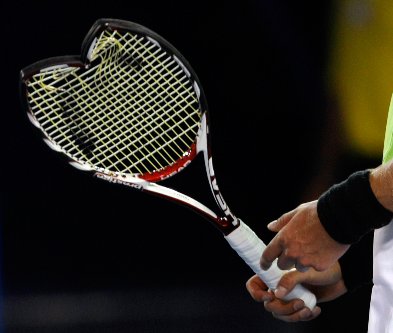 Russia&#39s Marat Safin&#39s broken racket is seen after he threw it at the ground during his match against Marcos Baghdatis of Cyprus at the Australian Open tennis tournament in Melbourne January 17, 2008. 
