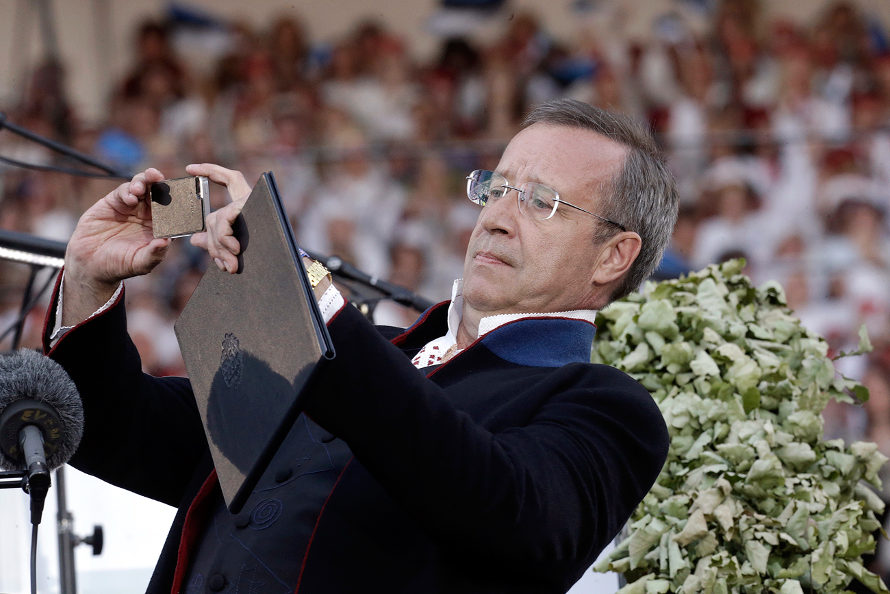 Estonia's President Toomas Hendrik Ilves takes a selfie during the Song and Dance Celebration in Tallinn. Source: Reuters