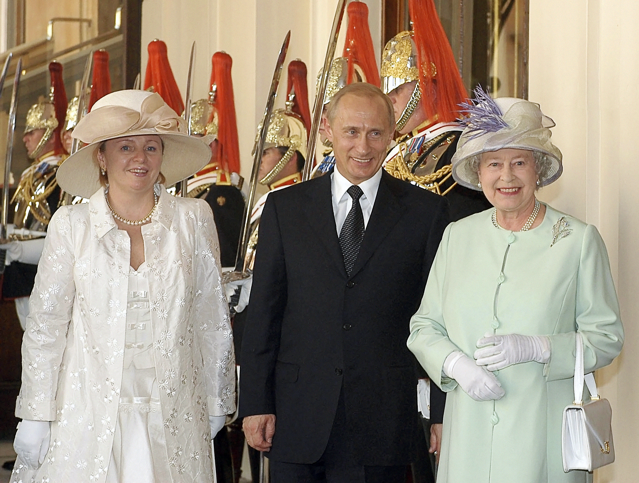 Queen of Britain Elizabeth II, President Putin, who arrived in Britain for a state visit, and his wife Lyudmila (L). Source: Alexey Panov / RIA Novosti