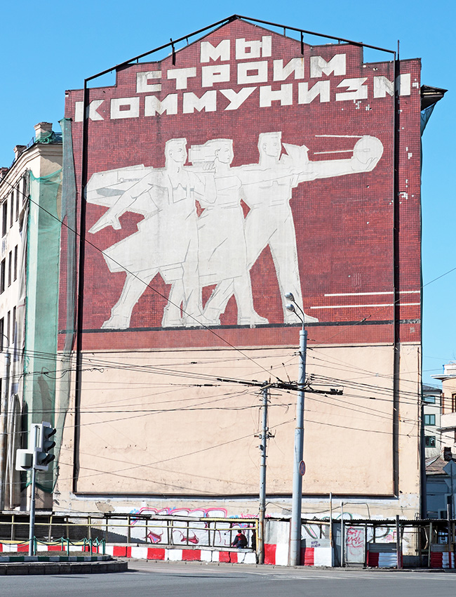 A "We build Communism" mosaic on the wall of a building in central Moscow.