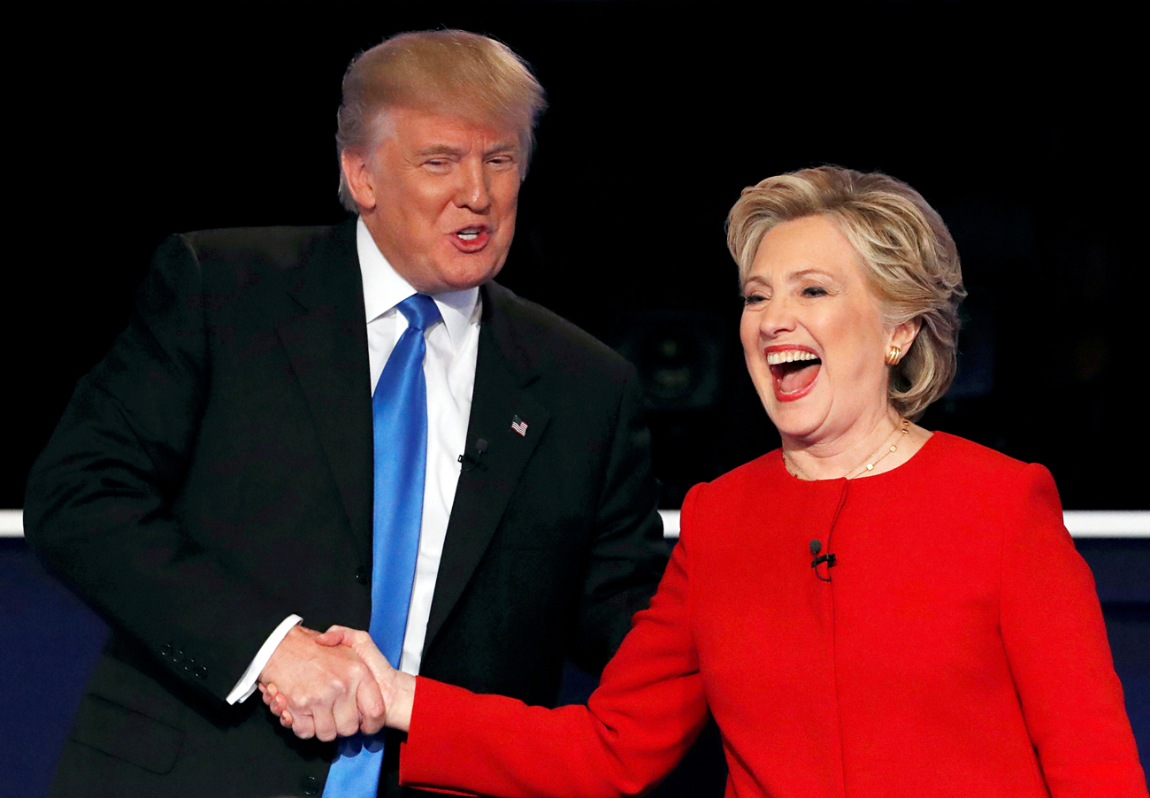 Republican U.S. presidential nominee Donald Trump shakes hands with Democratic U.S. presidential nominee Hillary Clinton at the conclusion of their first presidential debate at Hofstra University in Hempstead, New York, U.S., September 26, 2016.