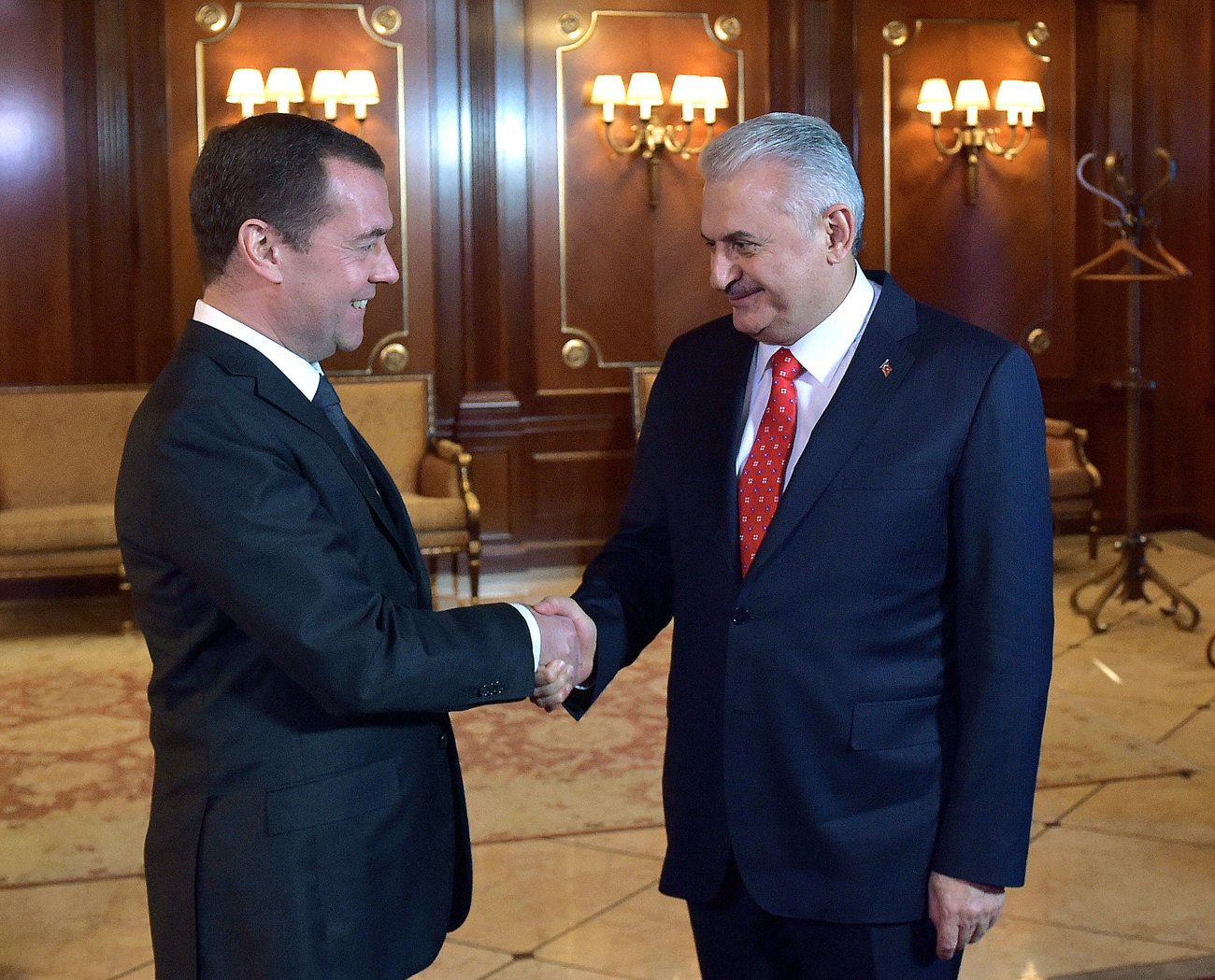 Russian Prime Minister Dmitry Medvedev and Turkish Prime Minister Binali Yildirim, right, during a meeting at the Gorki residence outside Moscow. Source: Alexander Astafyev/RIA Novosti