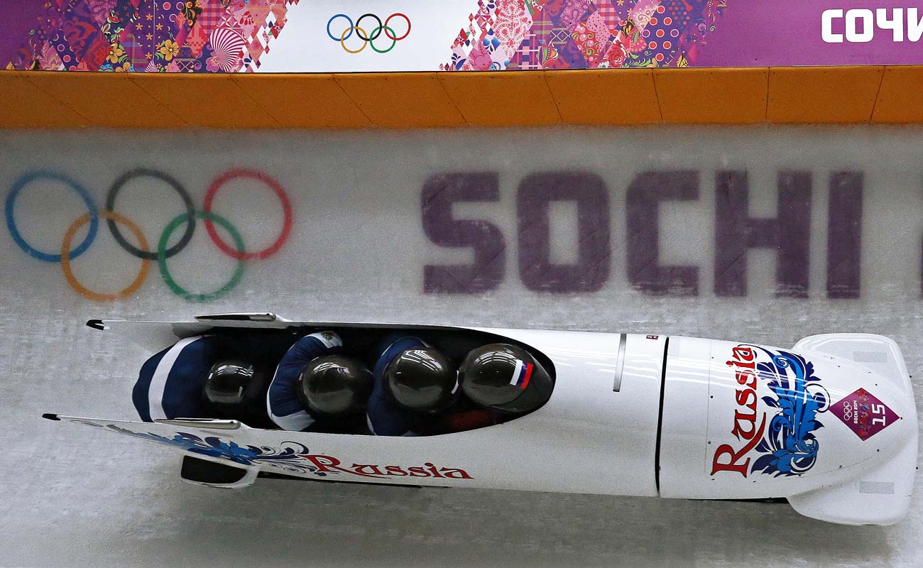 Nikita Zakharov, Pyotr Moiseyev, Nikolai Khrenkov and Maxim Morkousov (Russia) during the first heat of the four-man bobsleigh competition at the XXII Olympic Winter Games in Sochi. / Source: Vasily Ponomarev / RIA Novosti