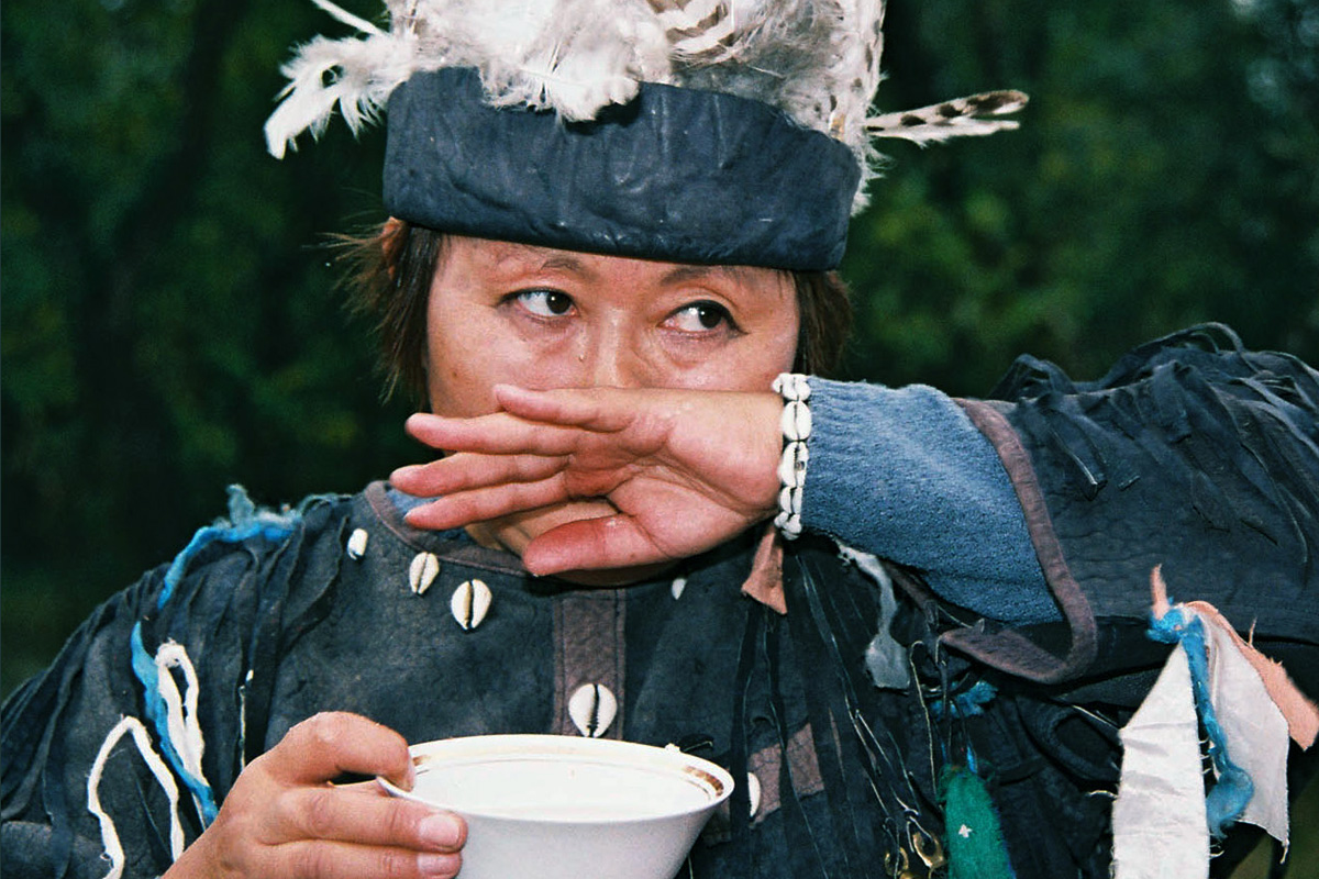 Shaman Tatyana Kobezhikova performs a worship ritual during the annual First Milk festival / TASS/Alexander Kolbasov