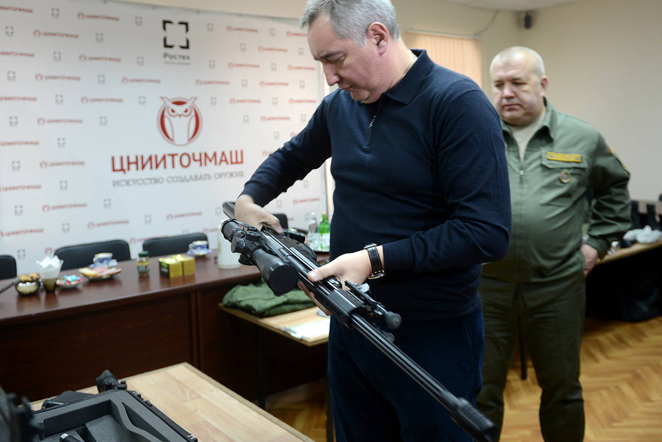 Russian Deputy Prime Minister Rogozin, front, and Dmitry Semizorov, right, head of TsNIITochMash, at the presentation of a new sniper complex rifle for Russian special agencies at the Central Research Institute for Precision Machine Building (TsNIITochMash), Rostec State Corporation, in Klimovsk. Source: Sergey Mamontov/RIA Novosti