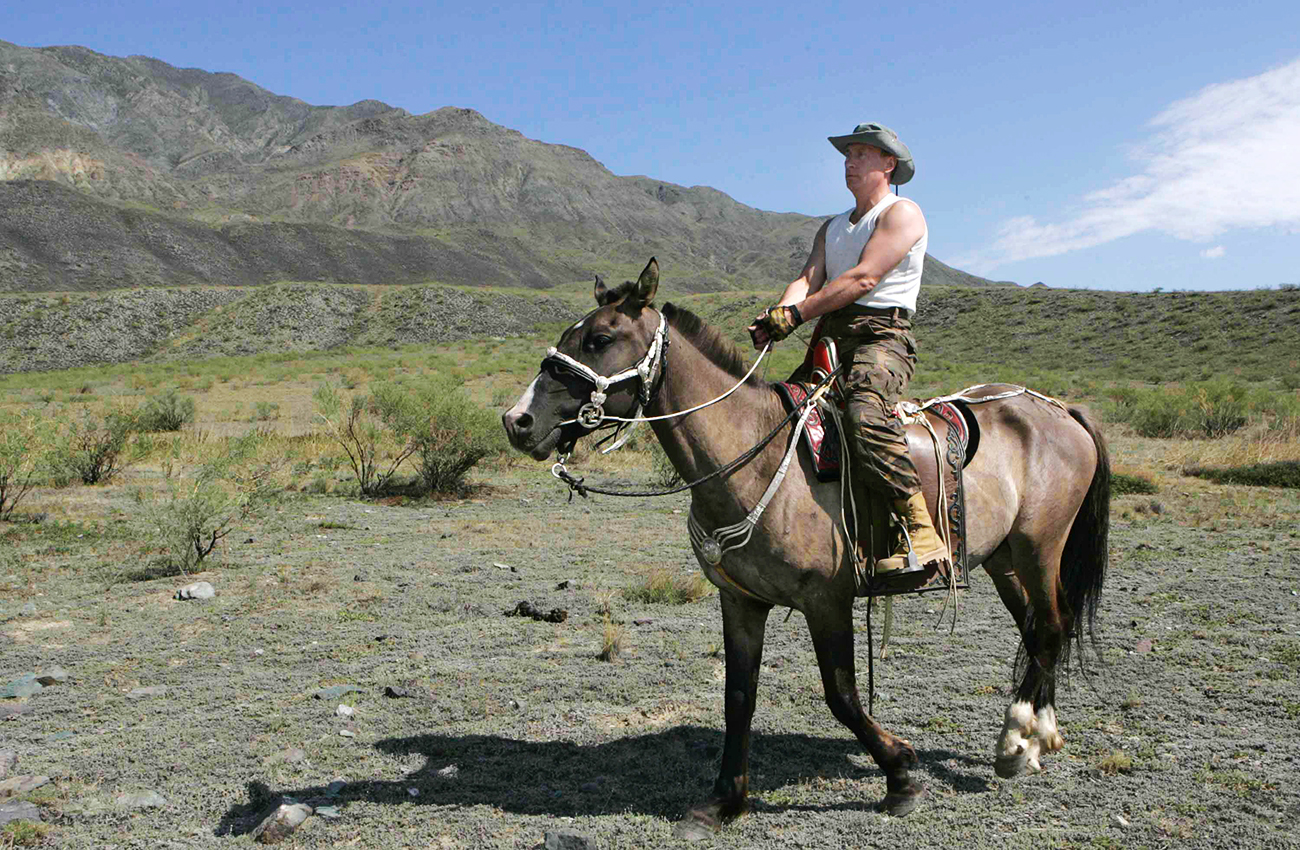 Russian President Vladimir Putin riding the horse at the spurs of the Western Sayan Mountains in the Republic of Tuva. Source: Dmitry Astakhov/RIA Novosti
