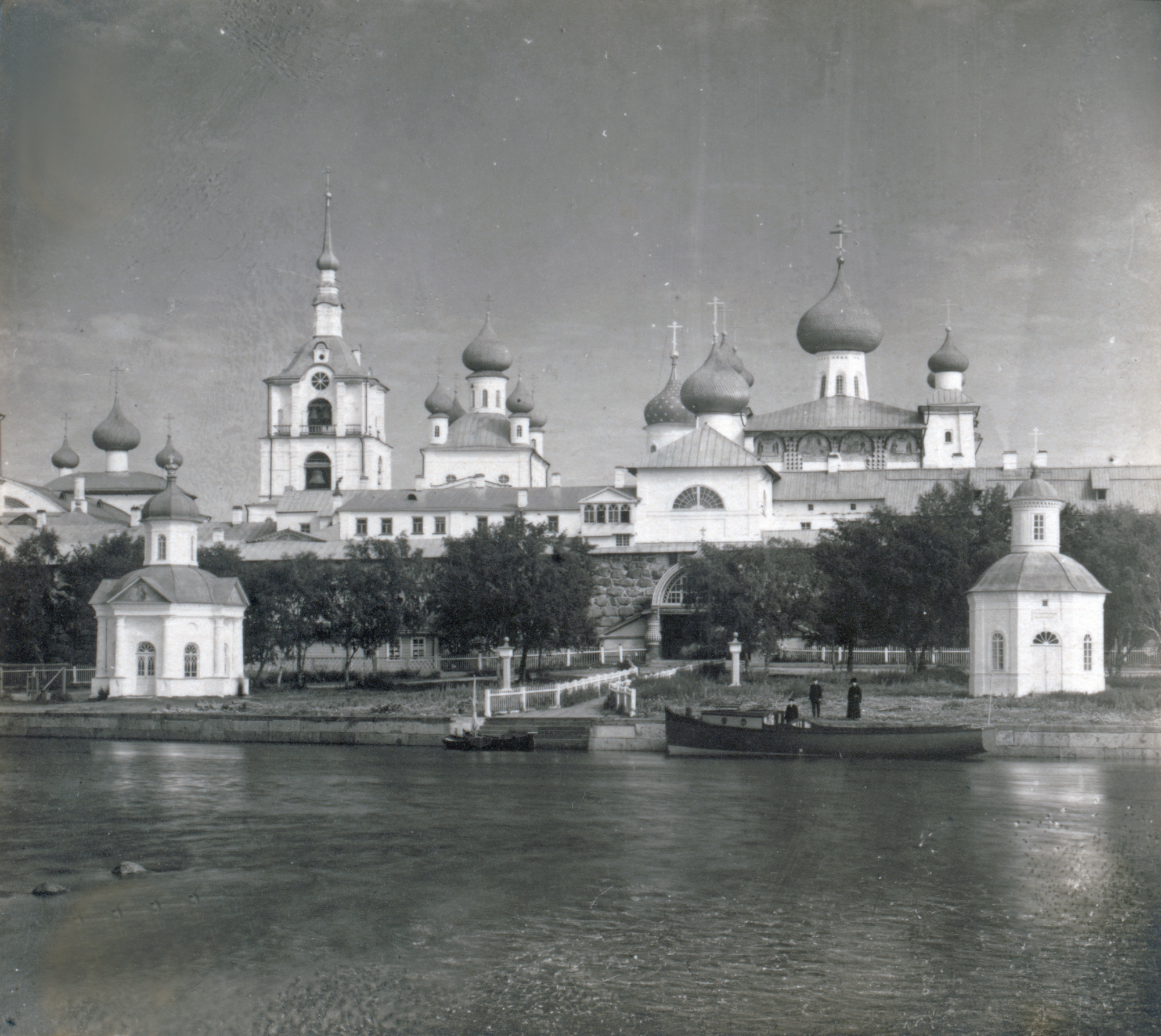 Solovetsky Transfiguration Monastery, west view. From left: Refectory Church of Dormition; Chapel of St. Alexander Nevsky; bell tower; Church of St. Nicholas; Church of Annunciation; west wall & Holy Gate; Transfiguration Cathedral; Chapel of Sts. Peter & Paul. Summer 1916. / Photo: Sergei Prokudin-Gorsky 