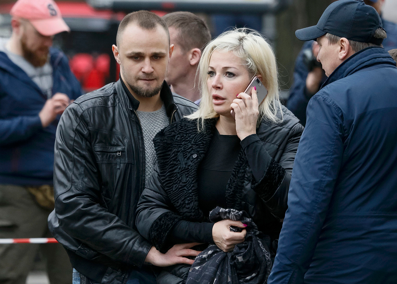 Maria Maksakova, widow of former lawmaker of the Russian State Duma Denis Voronenkov, speaks on her phone at the scene of the murder of her husband in central Kiev, Ukraine. Source: Reuters