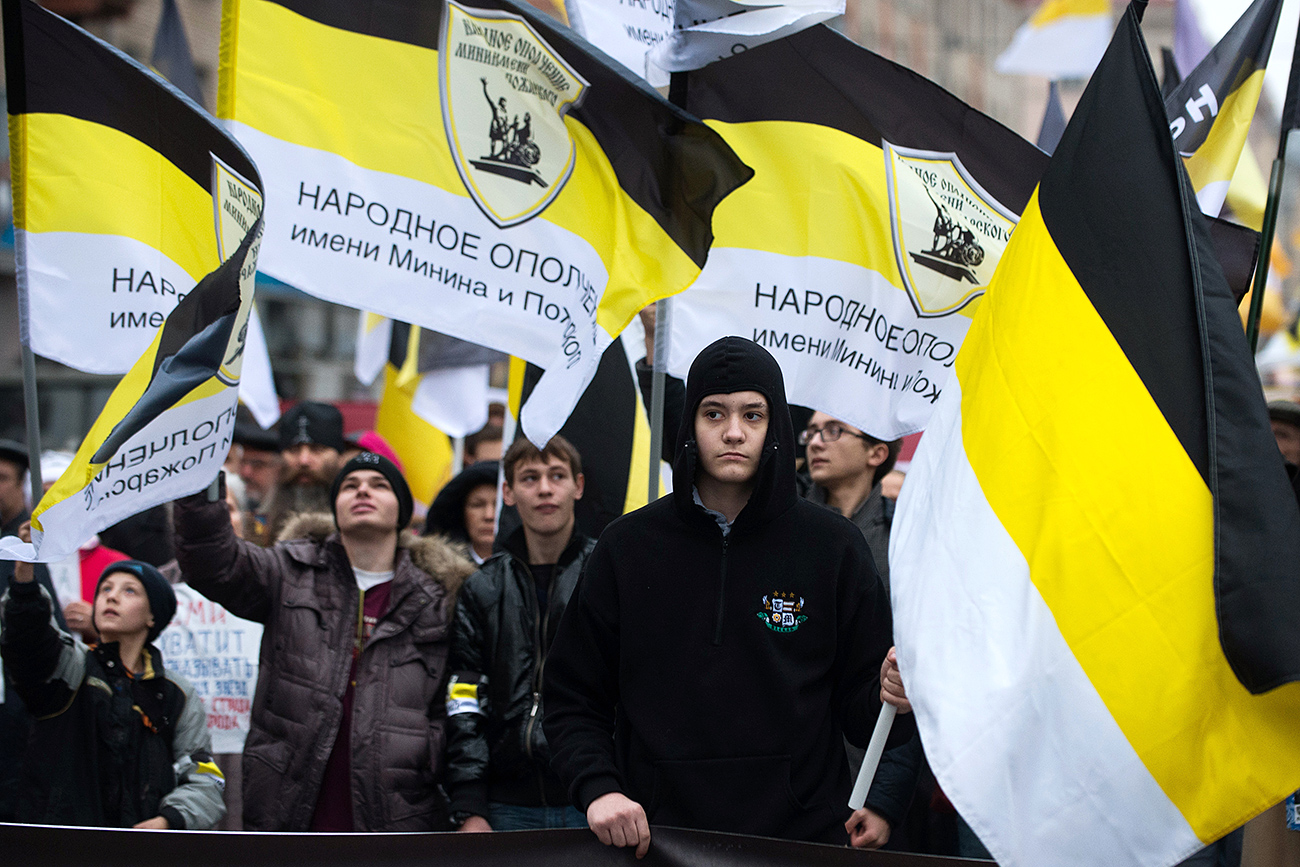 Participantes de la "Marcha del Zar" en Moscú, con motivo del cuarto centenario de la dinastía Romanov. Fuente: Alexander Vilf/RIA Novosti