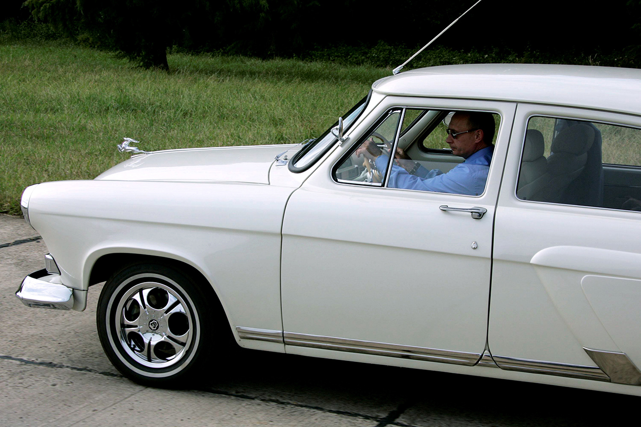 Russian President Vladimir Putin drives a GAZ-21 "Volga" 1956 to the opening of a new tunnel, Adler-Krasnaya Polyana in Sochi, Russia. Source: Vladimir Rodionov/RIA Novosti