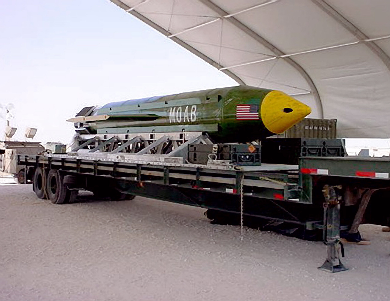 The GBU-43/B Massive Ordnance Air Blast bomb sits at an air base in Southwest Asia waiting to be used should it become necessary. Source: ZUMA Press/Global Look Press