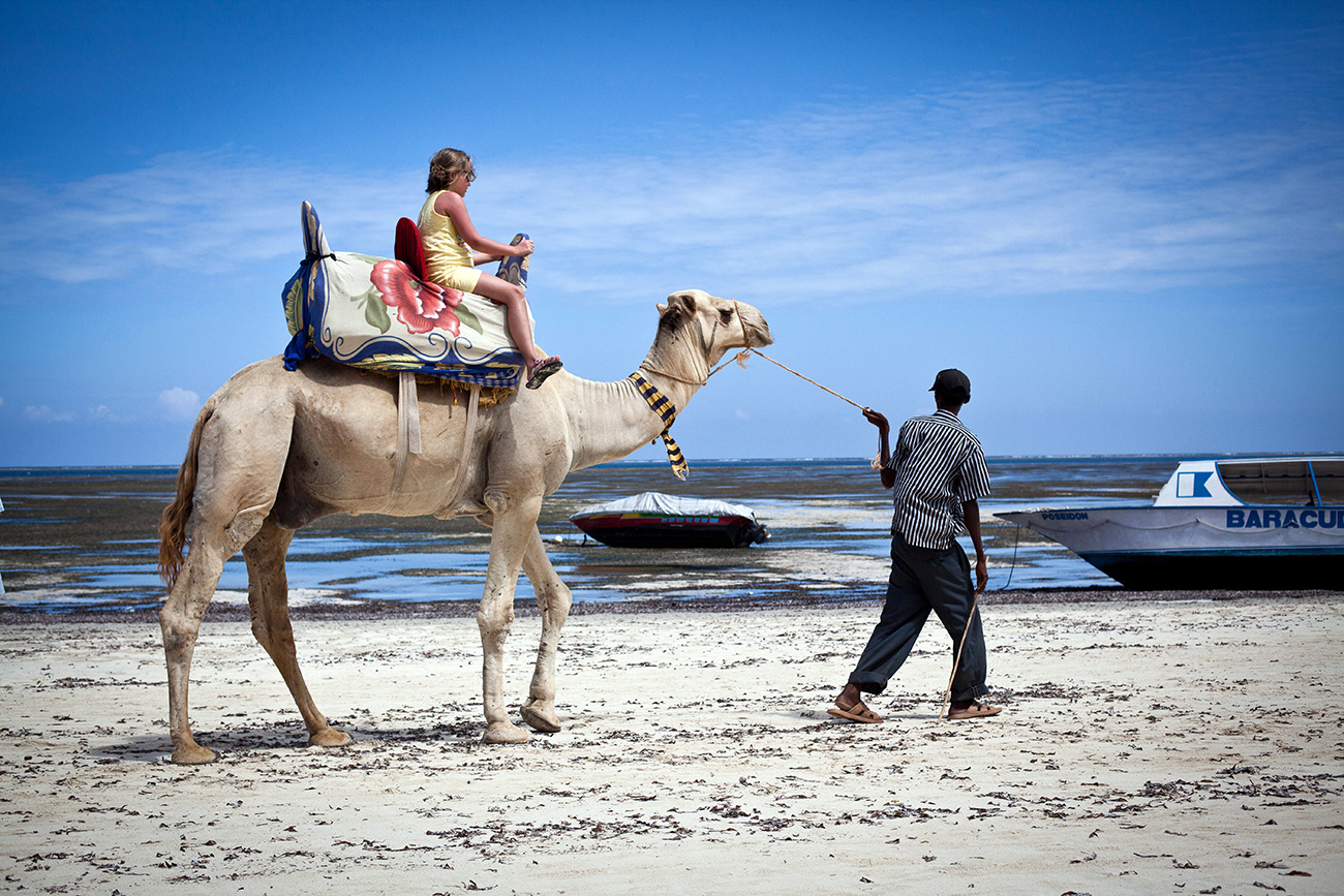 Many Russians can't really understand why a word like "negro" causes offense. Photo: A girl riding a camel along the Bamburi beach in the city of Mombasa. Source: AFP