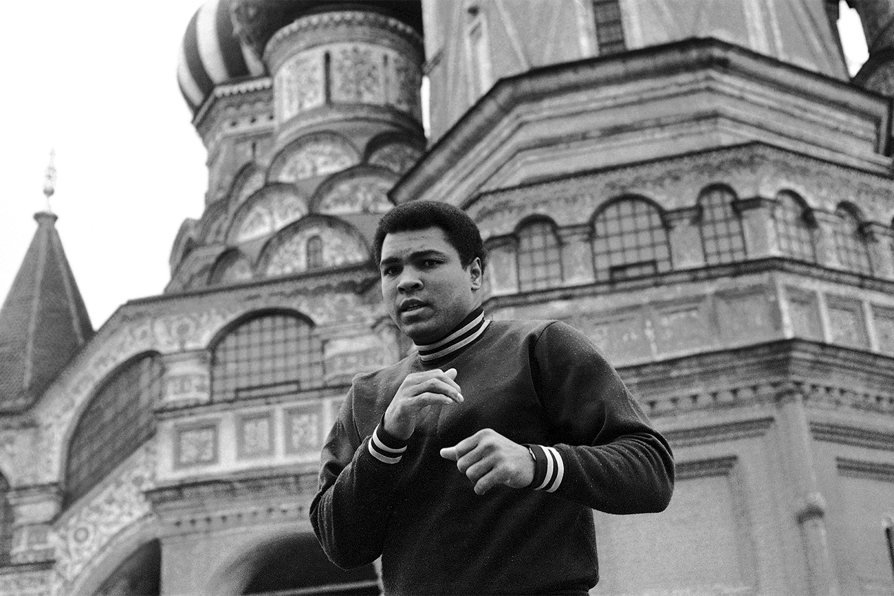 Muhammad Ali jogs past St. Basil's Cathedral. / AP