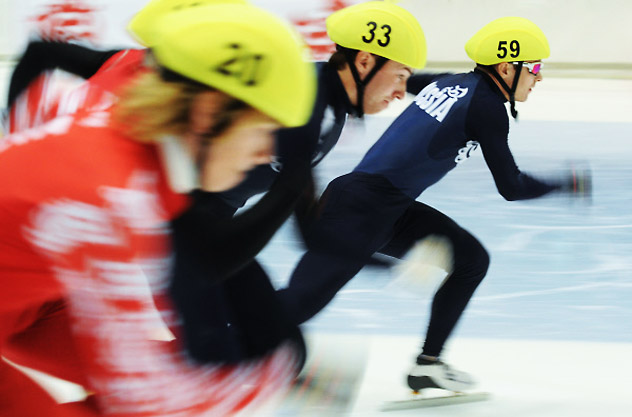  Professional skaters Vladimir Kuzovnikov (No.33) and Ruslan Zakharov (No.59) running the 500 meters distance during Russia's Short Track Skating Championship.  Source:vRIA Novosti / Alexey Filippov