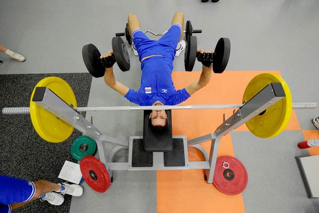 Aleksandr Volkov, a member of the Russia national men's volleyball team, working out during a training session in Novogorsk, outside, Moscow. Source: AFP/ Kirill Kudryavtse / East News