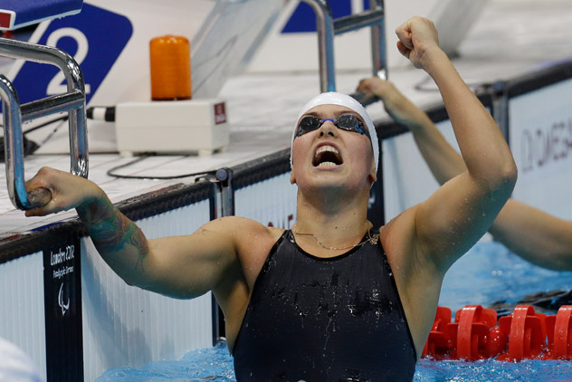 Russia's Oxana Savchenko celebrates after winning the 5th gold medal in the women's swimming at the 2012 Paralympics. Source: AP / Lefteris Pitarakis  