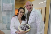 Yulia and Brad Garine show off one of their popular cheesecakes. Source: Press Photo