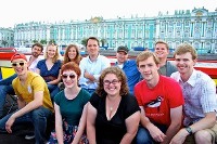 Russian history professor, Anton Fedyashin with his students on the boat tour in St. Petersburg, during “Dostoyevsky’s Russia” trip in July. Source: Press Photo.