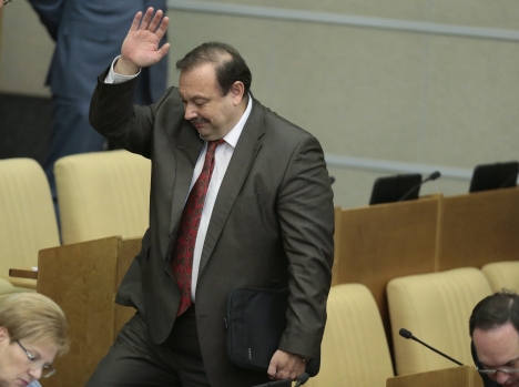 Russian opposition lawmaker Gennady Gudkov gestures as he leaves a plenary session of the State Duma, the lower parliament chamber, in Moscow, Russia, Friday, Sept. 14, 2012. Source: AP