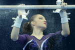 Aliya Mustafina prepares to compete on the uneven bars
