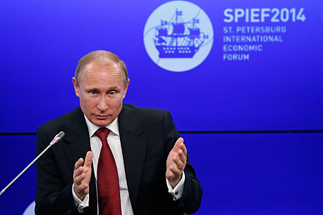 Putin says Russia ready to recognize Ukrainian elections