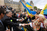 
 Press Digest: Firing continues in Donetsk; Poroshenko visits United States