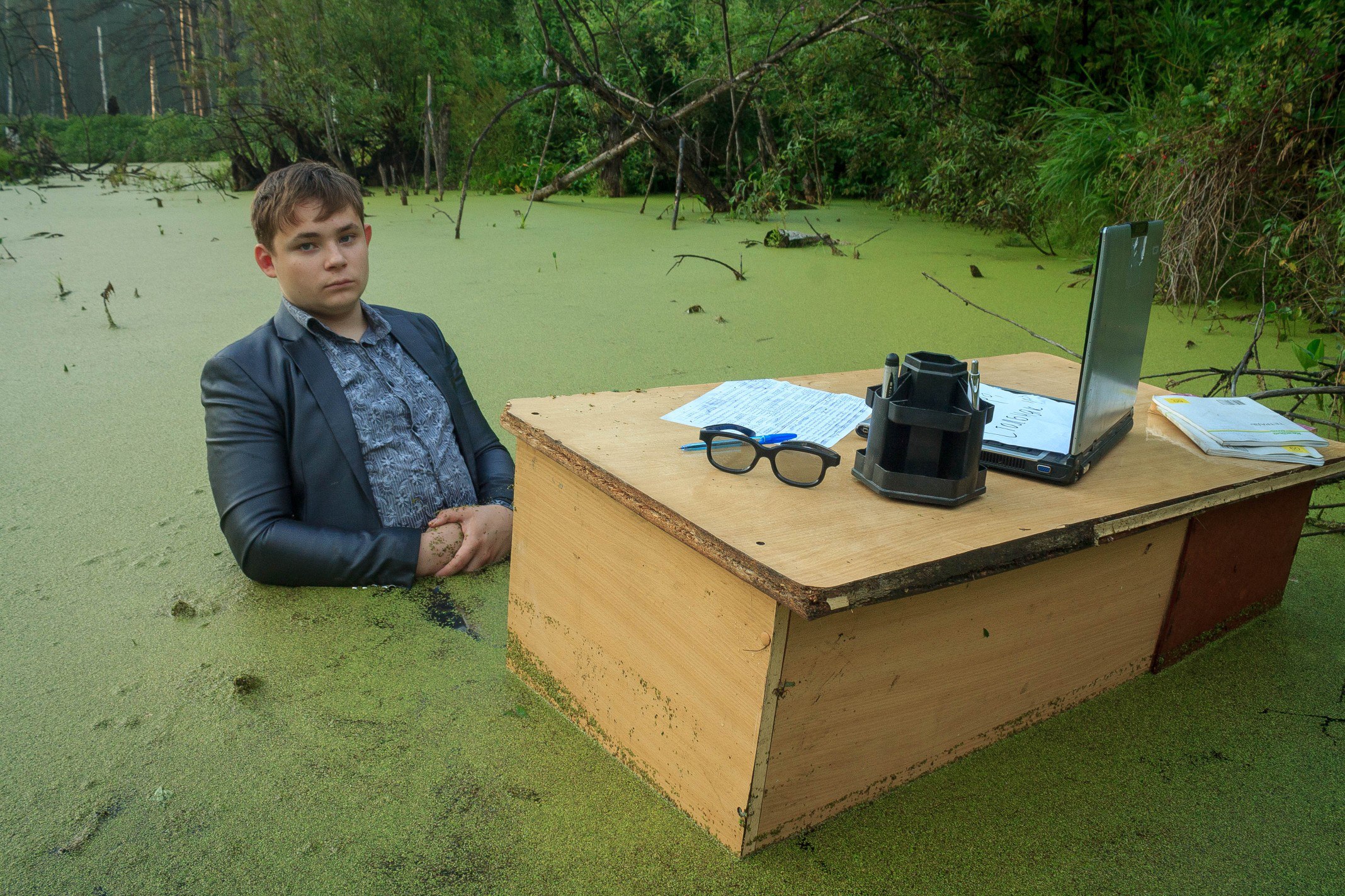 Russian schoolboy’s photo session in swamp goes viral